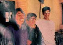 Maria y Jorgito con una tia